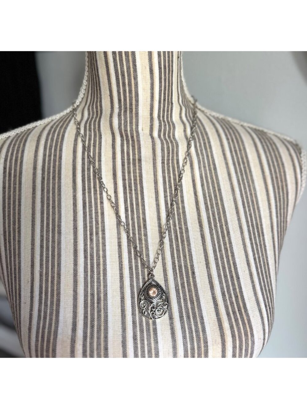 Silver Tone Necklace with Tear Drop Filigree Peach Orange Rhinestone Pendant